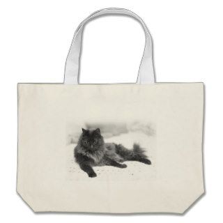 Smokey Gray Cat Laying on Bed Tote Bags