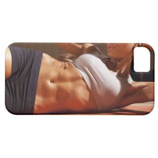 Female doing intense crunches, iPhone 5 cover