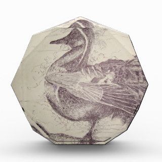 Product with a black and white drawing of a bird acrylic award