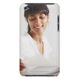 Young girl doing homework iPod touch Case Mate case