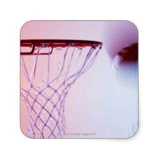 Blurred view of basketball going into hoop sticker