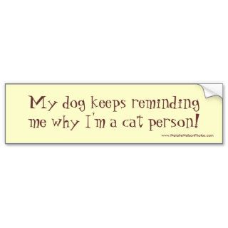 My dog keeps reminding me why I'm a cat person Bumper Sticker