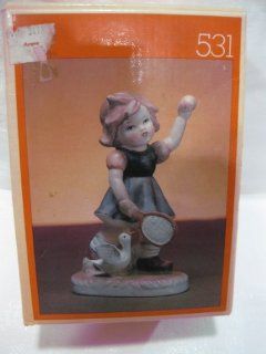Old Fashioned Statue Of A Little Girl Playing Tennis Table Top Figurine With A Playful Duck #531 Of The Collector's Choice Series Hand Painted China From Flambro Imports   Holiday Figurines