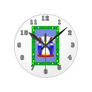2 belly dancers and an hour glass.png round wall clock