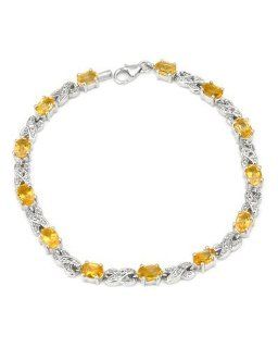 Sterling Silver 4.68 CTW Citrine and 0.27 CTW Topaz Women Bracelet. Length 7.5 in. Total Item weight 13.3 g. Jewelry