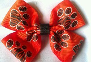 Bow   Orange Black Zebra Paw Print   3 Inch Double Boutique Bow   On Alligator Clip     Check Out My Other Items   Great for School or Party Favors, SHOW YOUR TEAM SPIRIT  ***** Also Available in Bow Key Chain **** Different Colors Available  Other Prod