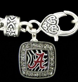 From the Heart Alabama Crimson Tide Red "A", Zebra Background, surrounded by Sparkling Crystal Rhinestone on a Heavy Silver Toned Metal Bracelet with a Beautiful Heart Lobster Clasp.Charm is s a Square Shape & approximately 1 inch long & 