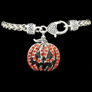 From the Heart Orange & Black Crystal Rhinestone Jack O'Lantern Pumpkin Bracelet.Halloween Pumpkin Charm is attached to Silver Metal Heavy Bracelet with Lobster Claw Closure.Fun Sweet Gift for Anyone who likes Halloween & Pumpkins) Will Mail i
