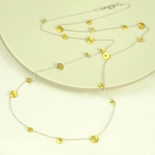 shangri la silver and gold necklace by melinda mulcahy