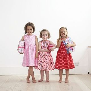 red dotty party dress with ties by toby tiger