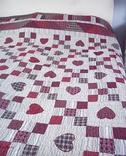 cream and red heart patchwork quilt large by coast and country interiors