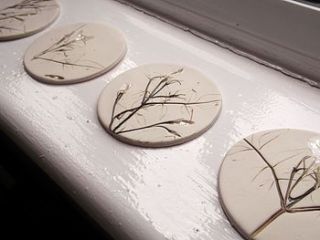 handmade coasters with flowers and leaves by melissa choroszewska ceramics