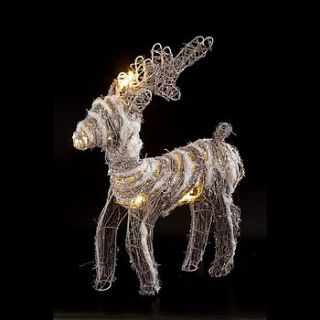 rattan reindeer with lights by little red heart