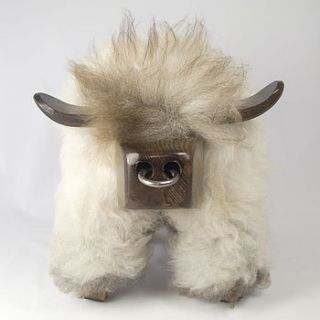 natural grey bull shaped sheepskin footstool by the wool room