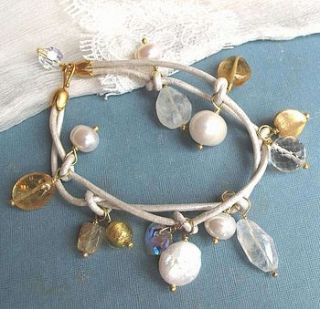 lotus gold hoop with rutilated quartz by melinda mulcahy