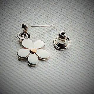 silver and rose gold daisy earrings by edition design shop