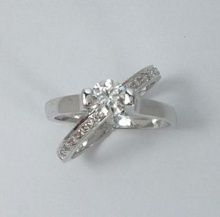 white gold diamond crossover ring by diamond affair