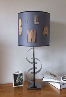 graphite wooden typography lampshade by judy holme