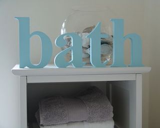 bath wooden letters by the cotton tree