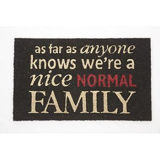 'we're a nice normal family' door mat by lucky roo