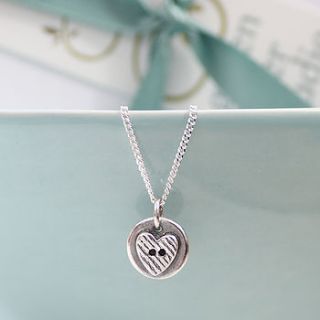 heart button silver necklace by green river studio