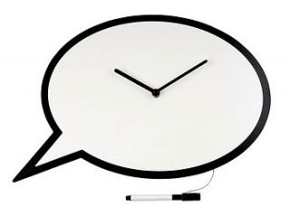 speech bubble white board clock by the contemporary home