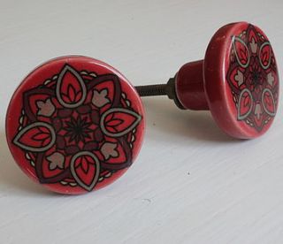 sunset red and black ceramic door knob by the forest & co