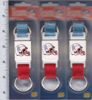 Lot of 3 Vintage 1990s NFL Houston Oilers Helmet Key Chain with Old Throwback Logo. Keychain sealed in original packaging 