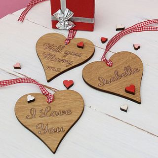 personalised set of wooden heart keepsakes by neltempo