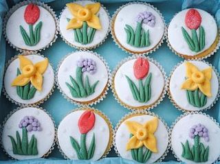 12 spring flower cupcakes by the small cake shop