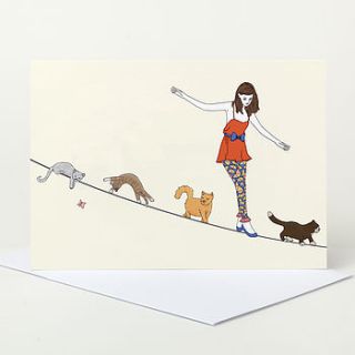 girl and cats on tightrope greeting card by sophie parker