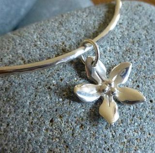 silver wildflower charm bangle by anne reeves jewellery