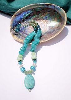 bright teal coloured necklace by jre collection