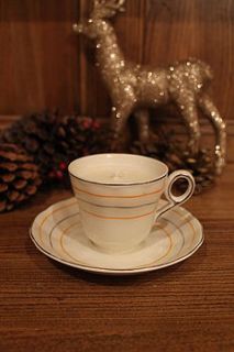 orange stripe vintage teacup candle by teacup candles