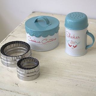 vintage enamel shaker and cookie cutter by ella james