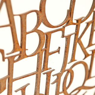 rusty metal alphabet letter sign by wild ink