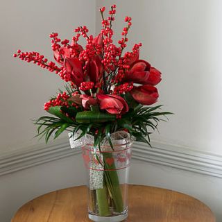 classic winter red amaryllis & berry bouquet by the flower studio