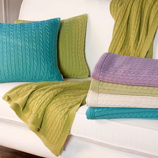 classic knitted cable throw and cushion cover by jodie byrne