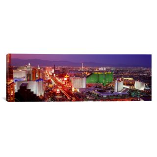 iCanvasArt Panoramic Buildings Lit up at Dusk in a City, Las Vegas