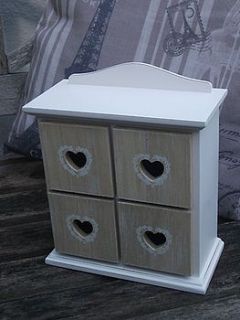 natural four drawer chest by the hiding place