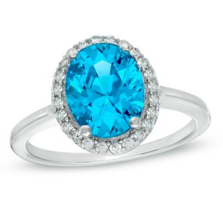 Oval London Blue Topaz and 1/4 CT. T.W. Diamond Ring in Sterling