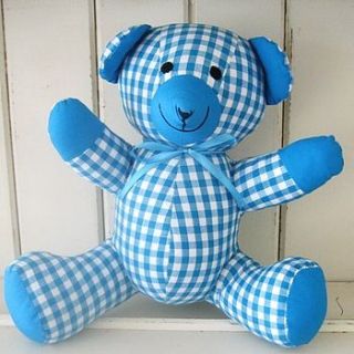 gingham teddy bear  by the fairground