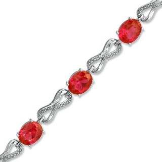 Oval Lab Created Ruby and Diamond Accent Knot Bracelet in Sterling