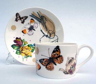 'garden tea party' yellow cup and saucer by the art salon