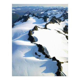 Snow covered Mountain Peaks   Aerial View Flyers