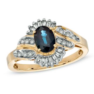 oval blue sapphire and 1 3 ct t w baguette and round diamond ring in