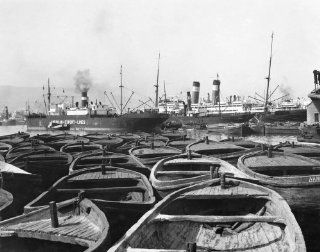 National geographic Wall Decals Showing the Crowded Condition of a Part of the Harbor the Barges Are Probably for Unloading Grain Primitive Methods Are Used Although Greece Imports Much Grain from America and Canada   18 inches x 14 inches   Peel and Stick