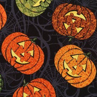 Hallowgraphix II quilt fabric designed by Jason Yenter for In The Beginning, pumpkins on black