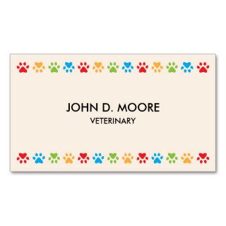Colorful paw prints veterinary or pet services business card