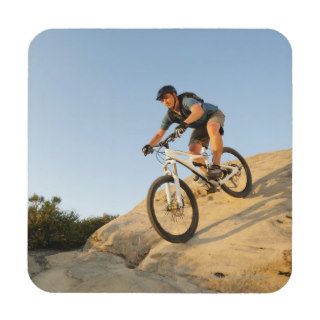 USA, California, Laguna Beach, Man cycling down Drink Coaster